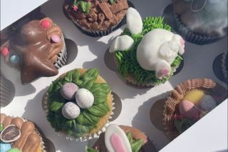 A box of easter themed
      cupcakes