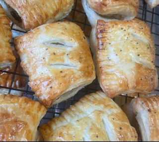 Sausage rolls on a
        cooling rack